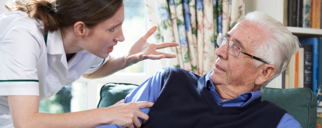 An elderly gentleman becoming a victim of verbal elder abuse by an assisted living facility nurse