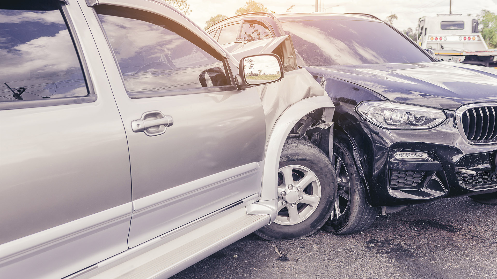 Two cars in a side impact crash.