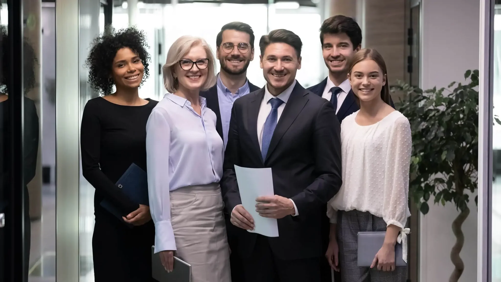 group of people smiling at the viewer