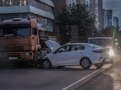 Car in angle accident with a semitruck.